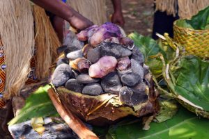 Baked potatoes on hot stones